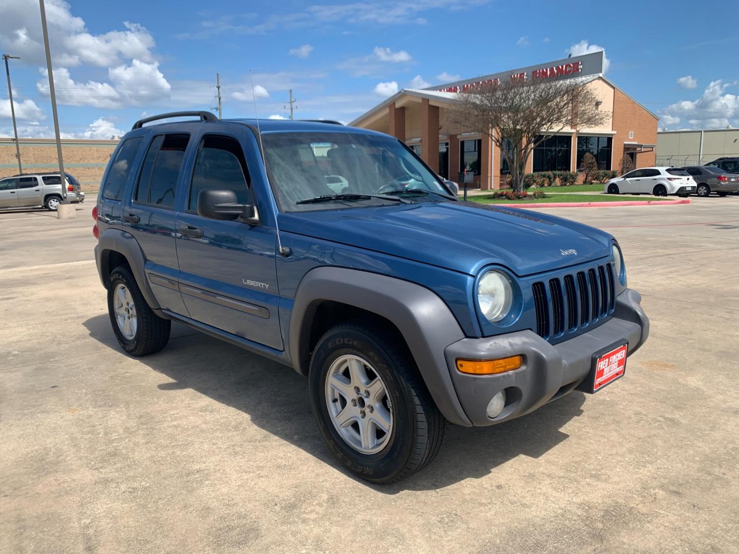 2004 blue /black Jeep Liberty Columbia Edition 2WD (1J4GK48KX4W) with an 3.7L V6 SOHC 12V engine, Automatic transmission, located at 14700 Tomball Parkway 249, Houston, TX, 77086, (281) 444-2200, 29.928619, -95.504074 - Photo#0